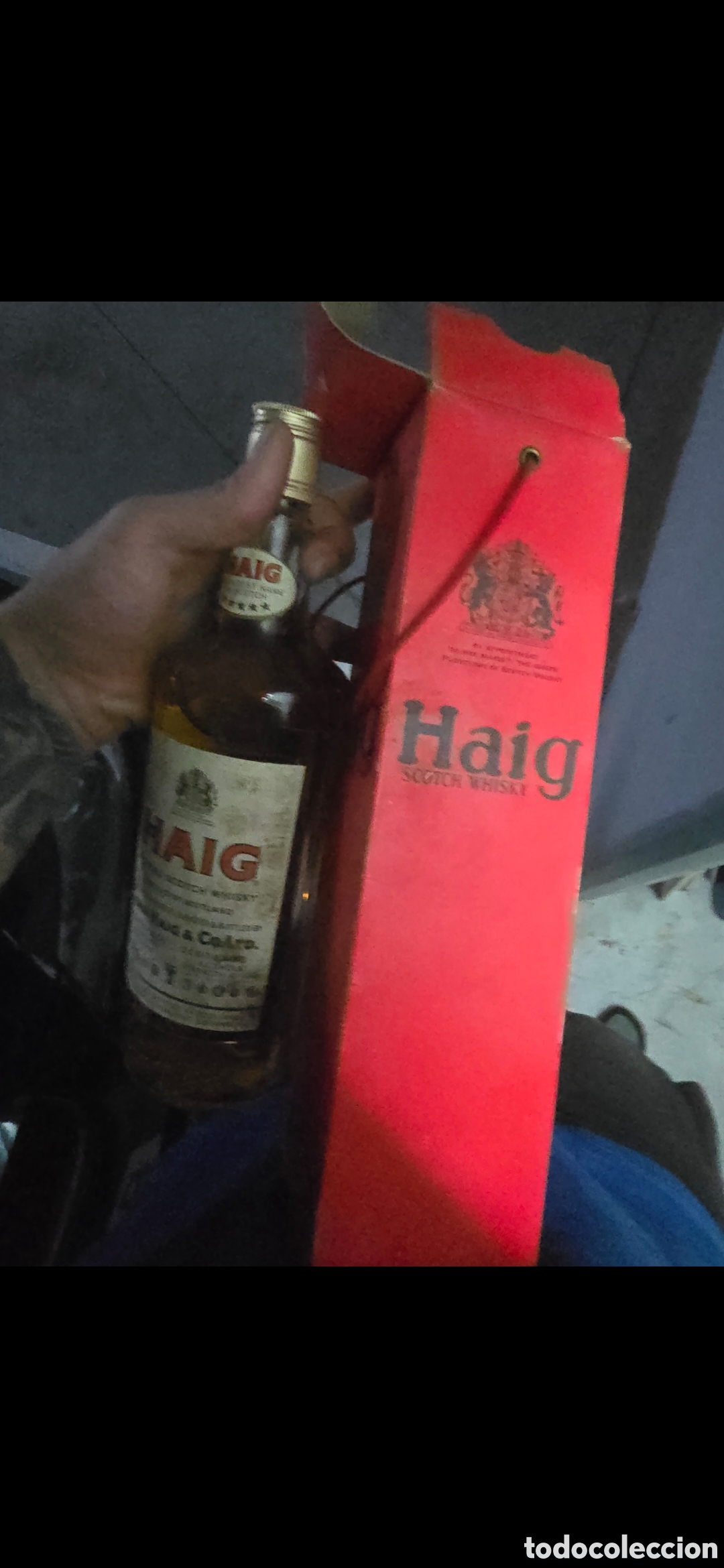 Botellas antiguas: Botella con su caja original