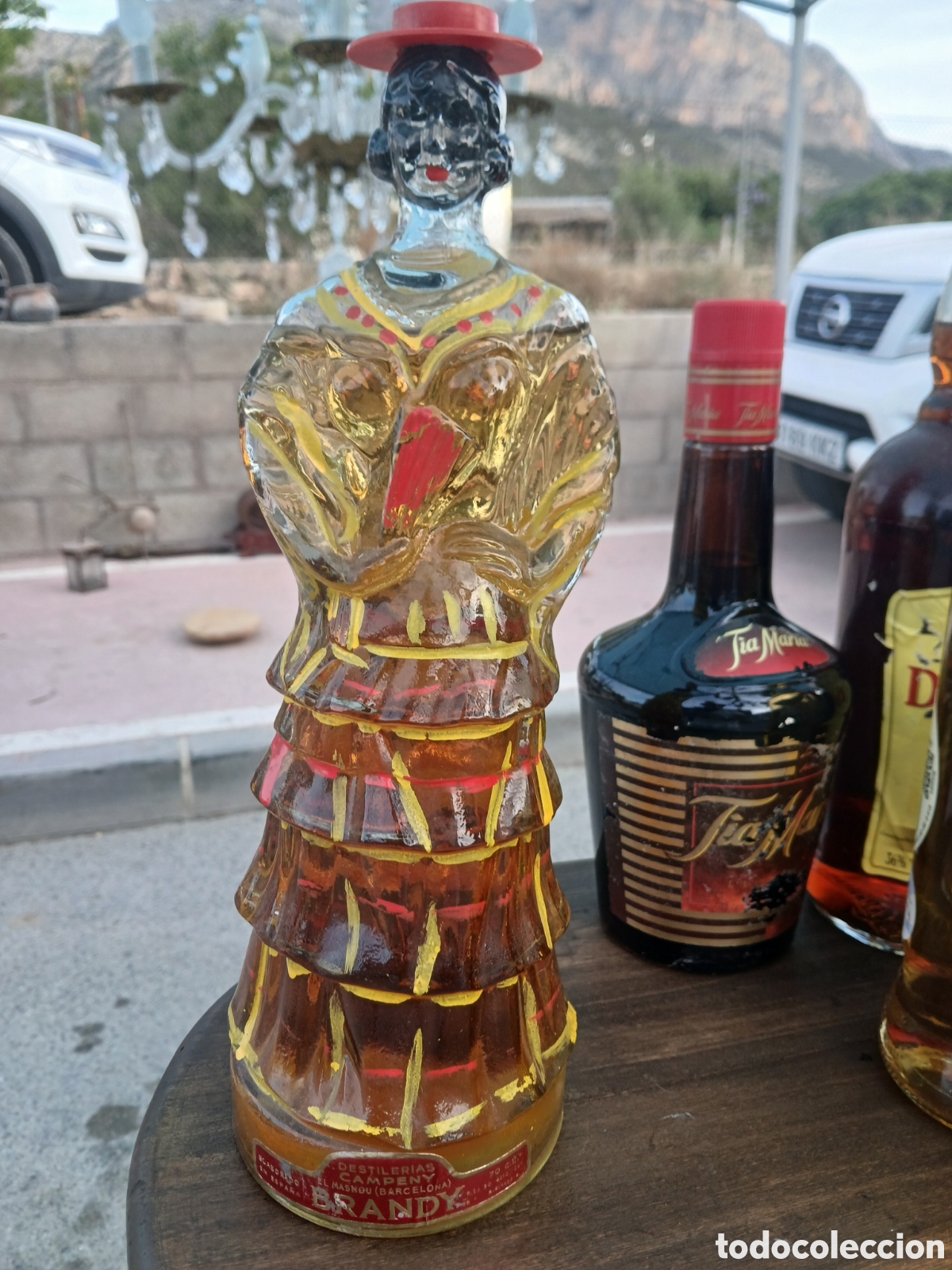 Botellas antiguas: BOTELLA BRANDY DESTILERIAS CAMPENY MASNOU SEVILLANA ( LLENA )