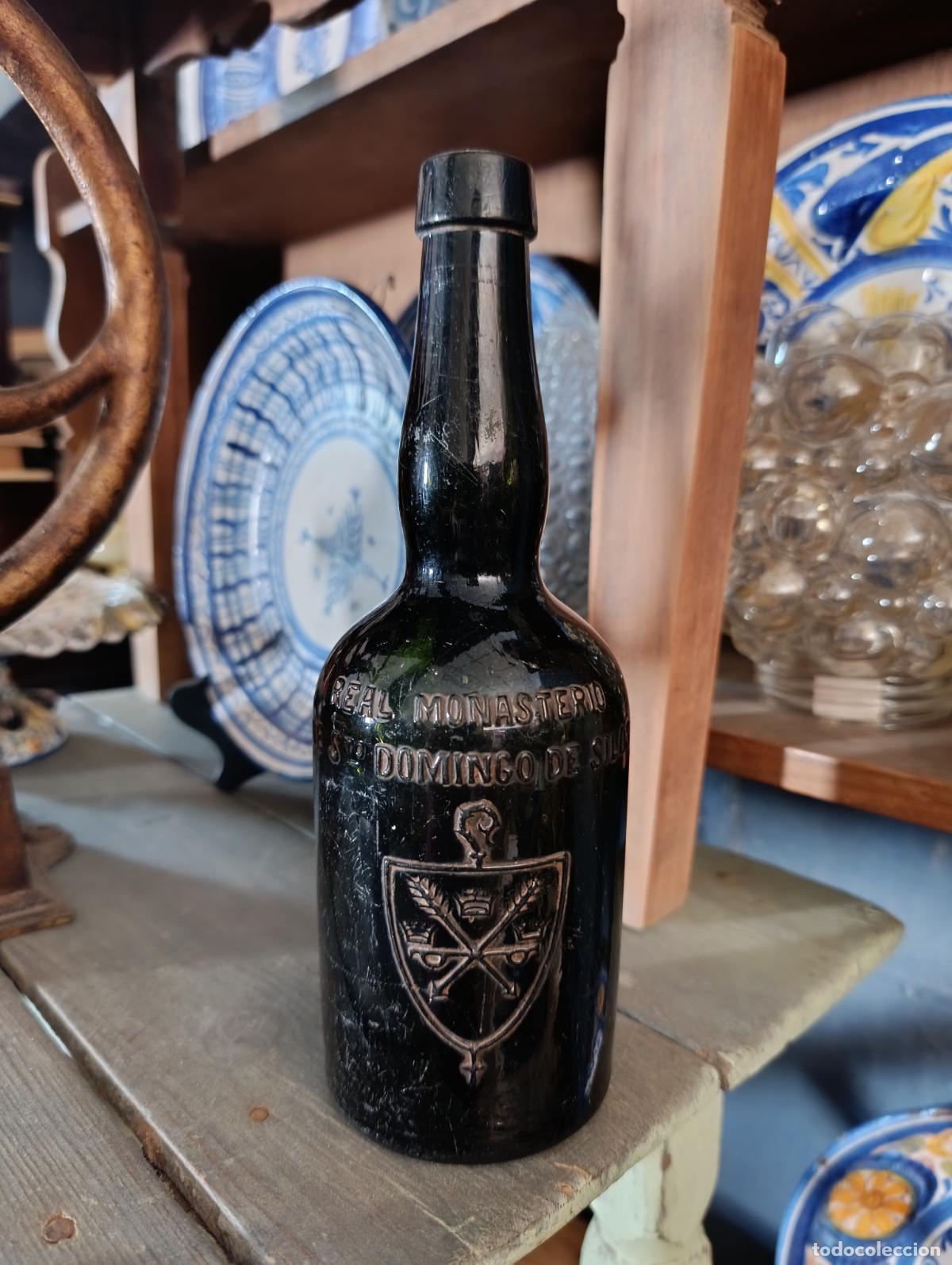 Botellas antiguas: BOTELLA EN RELIEVE REAL MONASTERIO STO DOMINGO DE SILOS