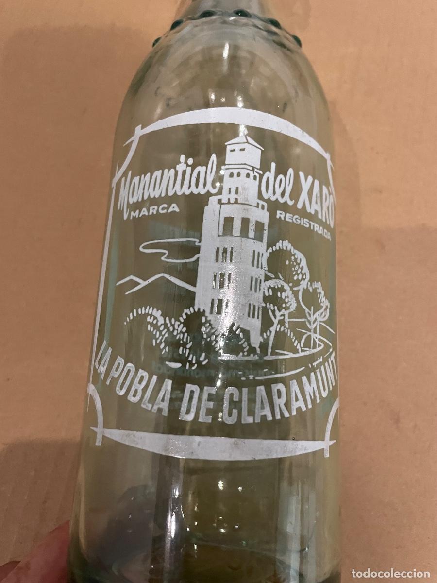 Botellas antiguas: LA POBLA DE CLARAMUNT - ANTIGUA BOTELLA GASEOSA 1 LITRO MANANTIAL DEL XARO PRODUCTOS CARBONICOS EMBO