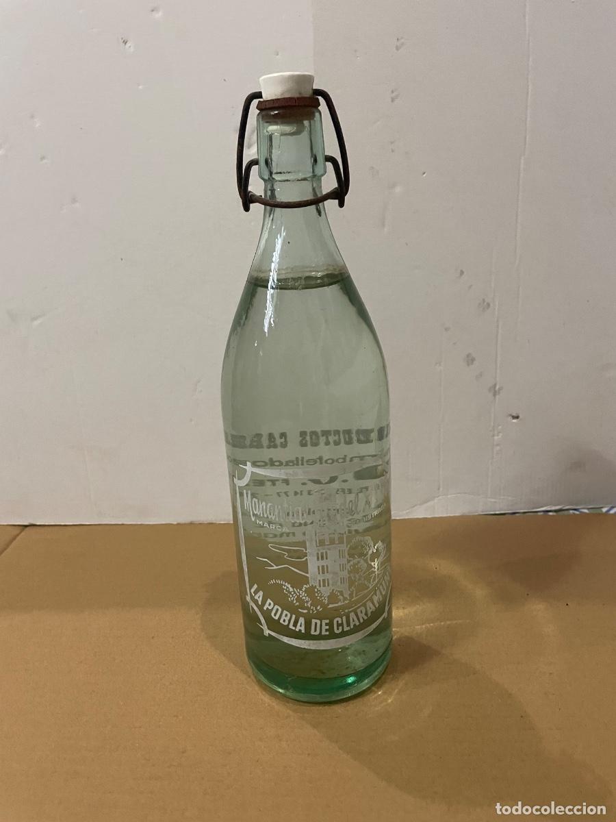 Botellas antiguas: LA POBLA DE CLARAMUNT - ANTIGUA BOTELLA GASEOSA 1 LITRO MANANTIAL DEL XARO PRODUCTOS CARBONICOS EMBO