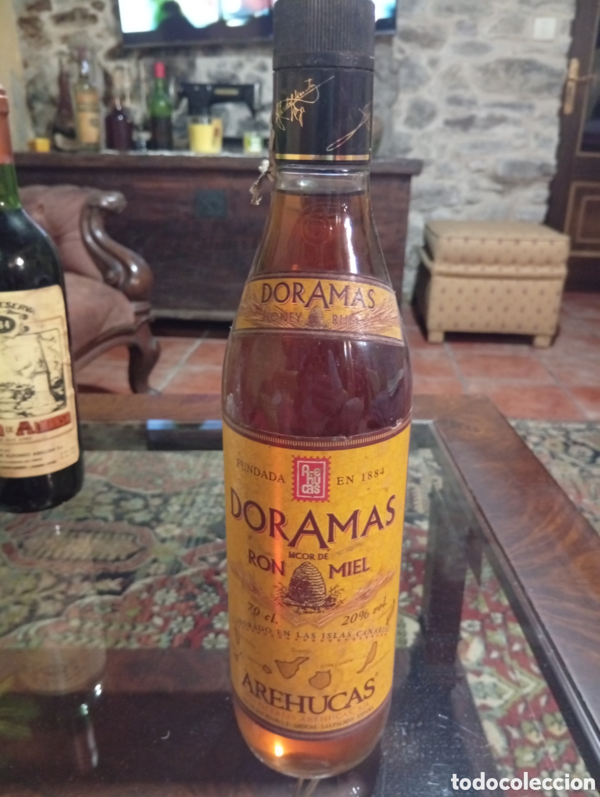 Botellas antiguas: Botella Arehucas ron miel - Foto 1