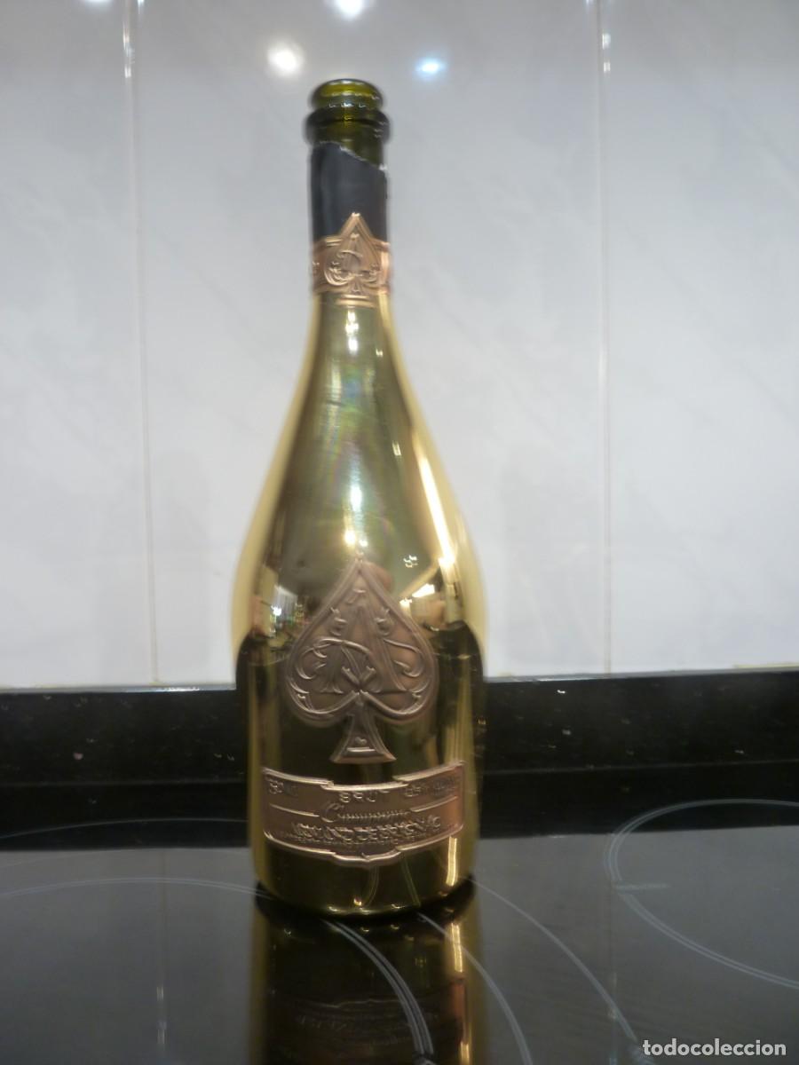 Alte Flaschen: Champagne Armand de Brignac. Botella vac&iacute;a