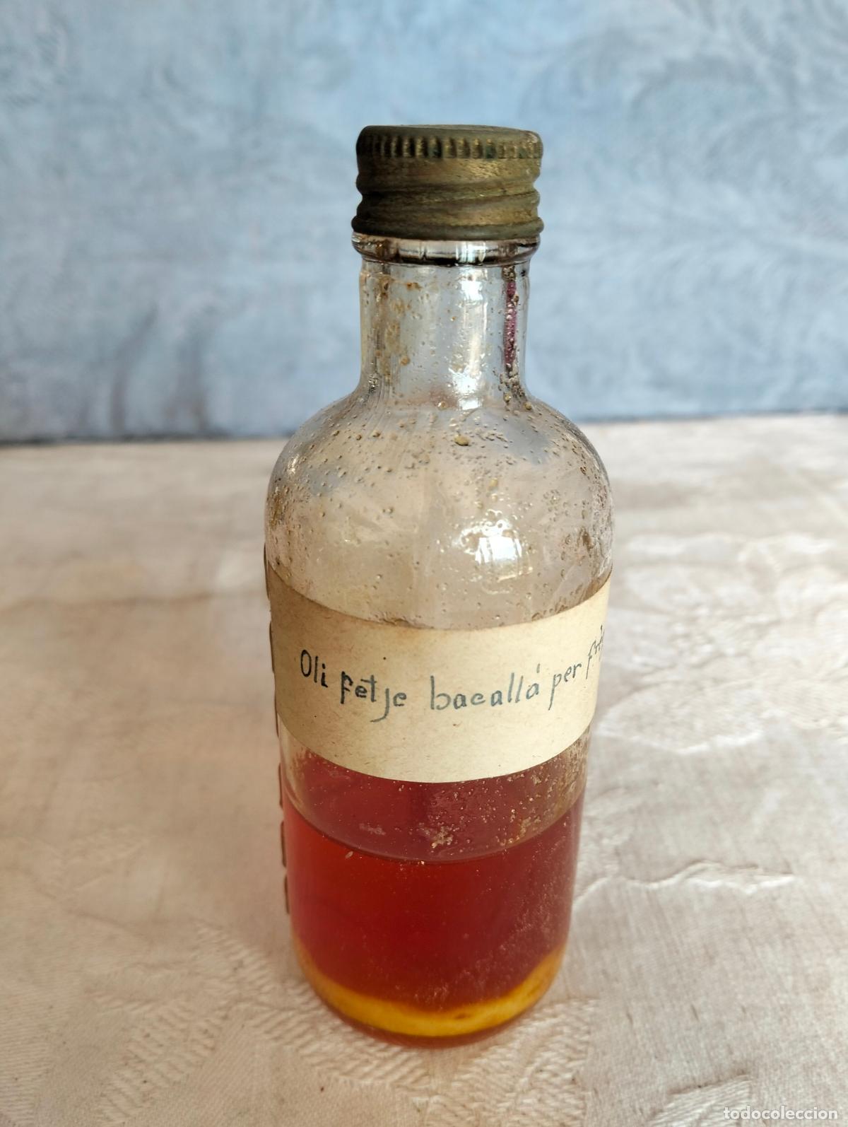 Botellas antiguas: Antigua botella de cristal transparente frasco catal&aacute;n oli fetge de bacall&agrave; fetje higado bacalao 50s