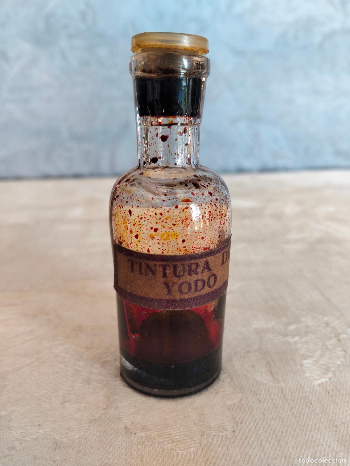 Botellas antiguas: Antigua botella de cristal transparente frasco bote tintura de yodo medicamento a&ntilde;os 50