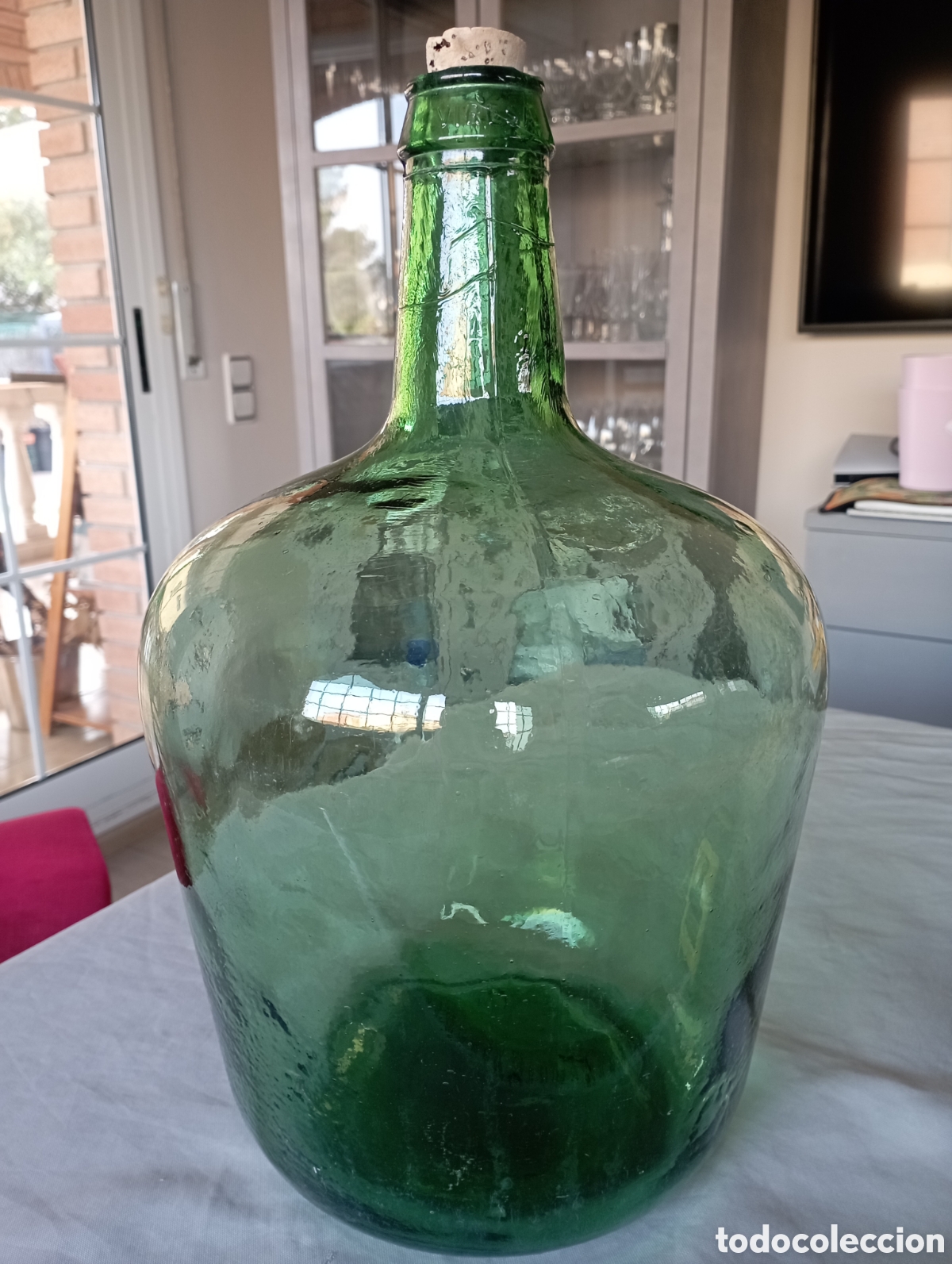 Botellas antiguas: Garrafa de vidrio verde vintage