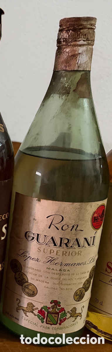 Botellas antiguas: Ron guaran&iacute; superior - Foto 1