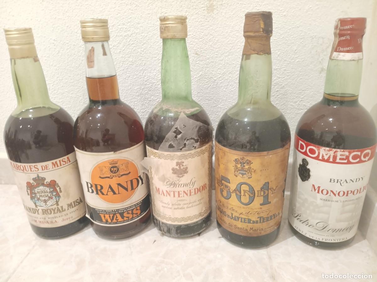 Botellas antiguas: 5 botellones solo en mano brandy