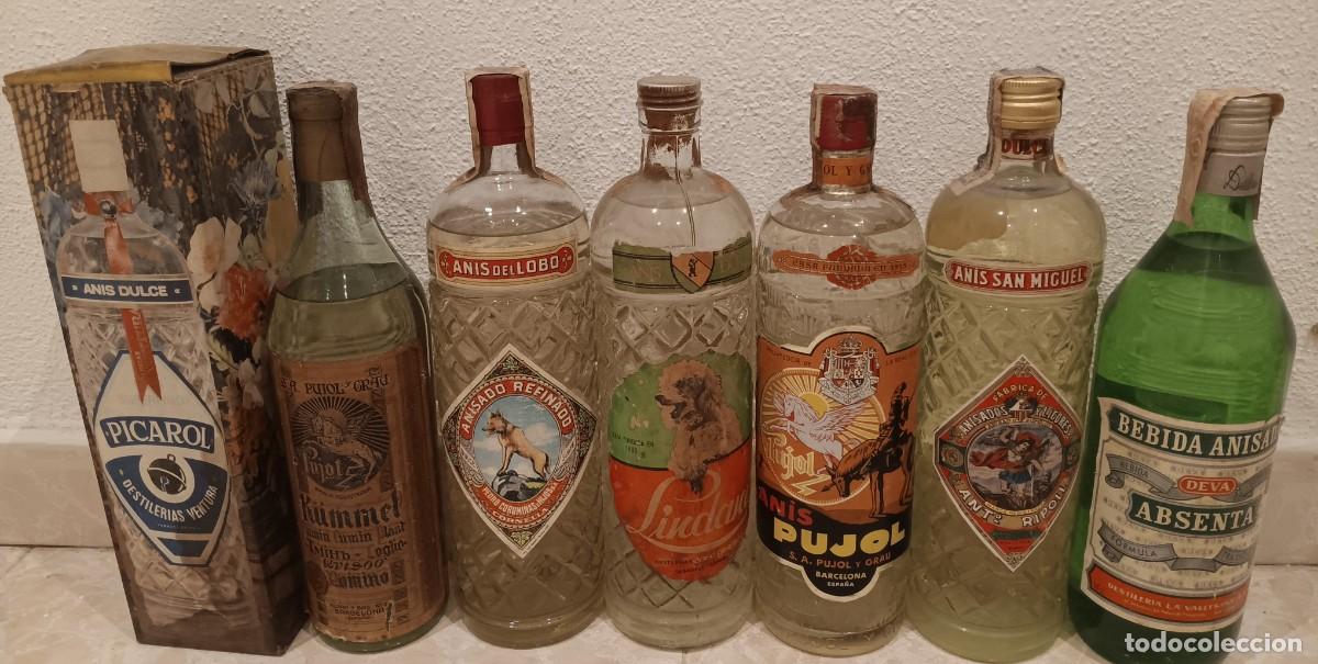 Botellas antiguas: 7 botellones solo en mano