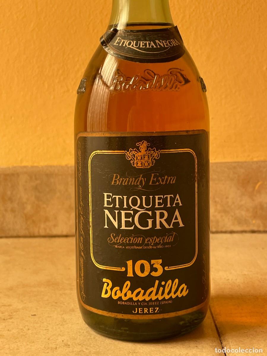 Botellas antiguas: Botella Brandy Extra 103 Etiqueta Negra Bobadilla Jerez Precintada Vintage