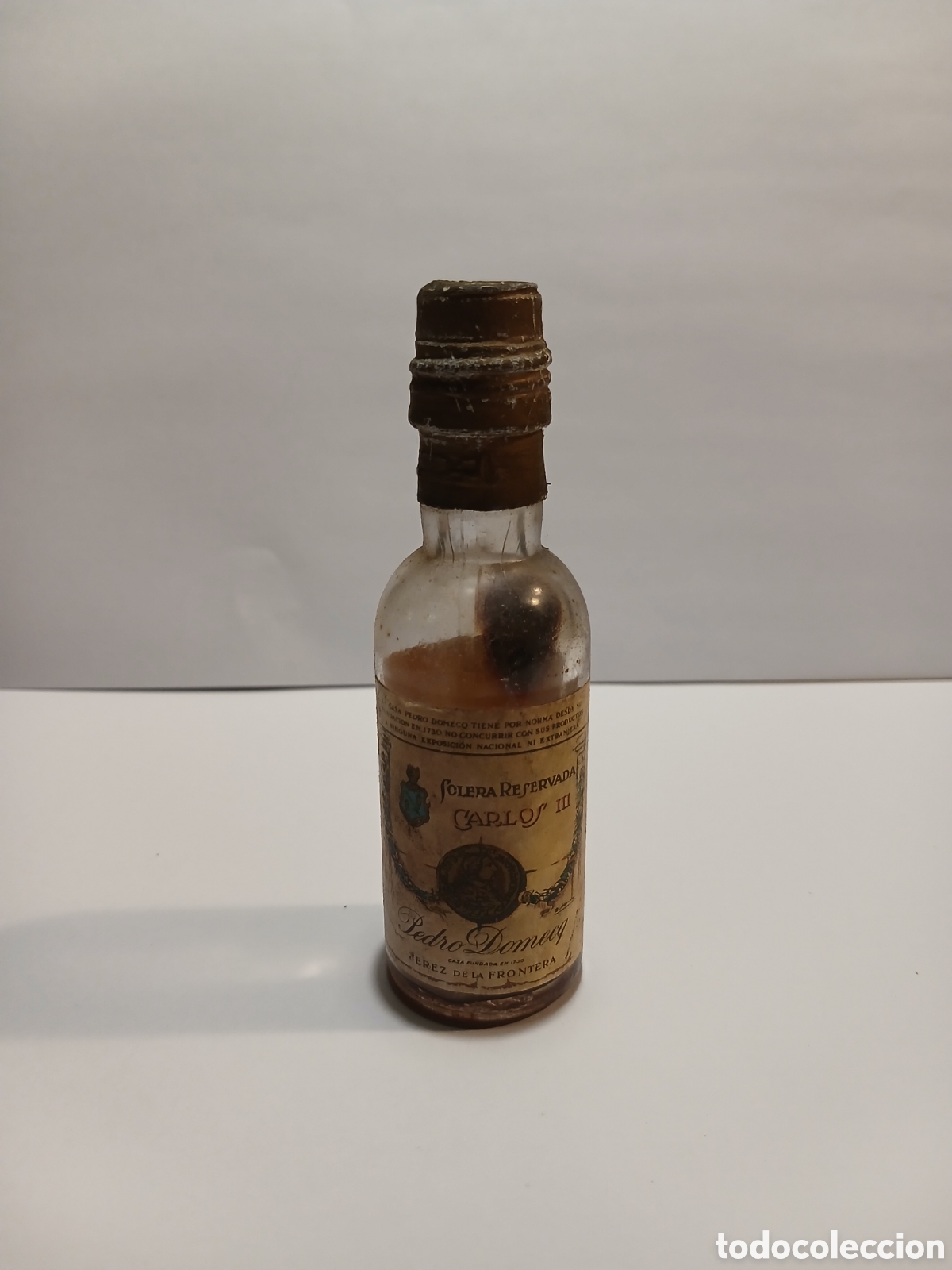 Botellas antiguas: Botella antigua Carlos III a&ntilde;os 60-70 miniatura