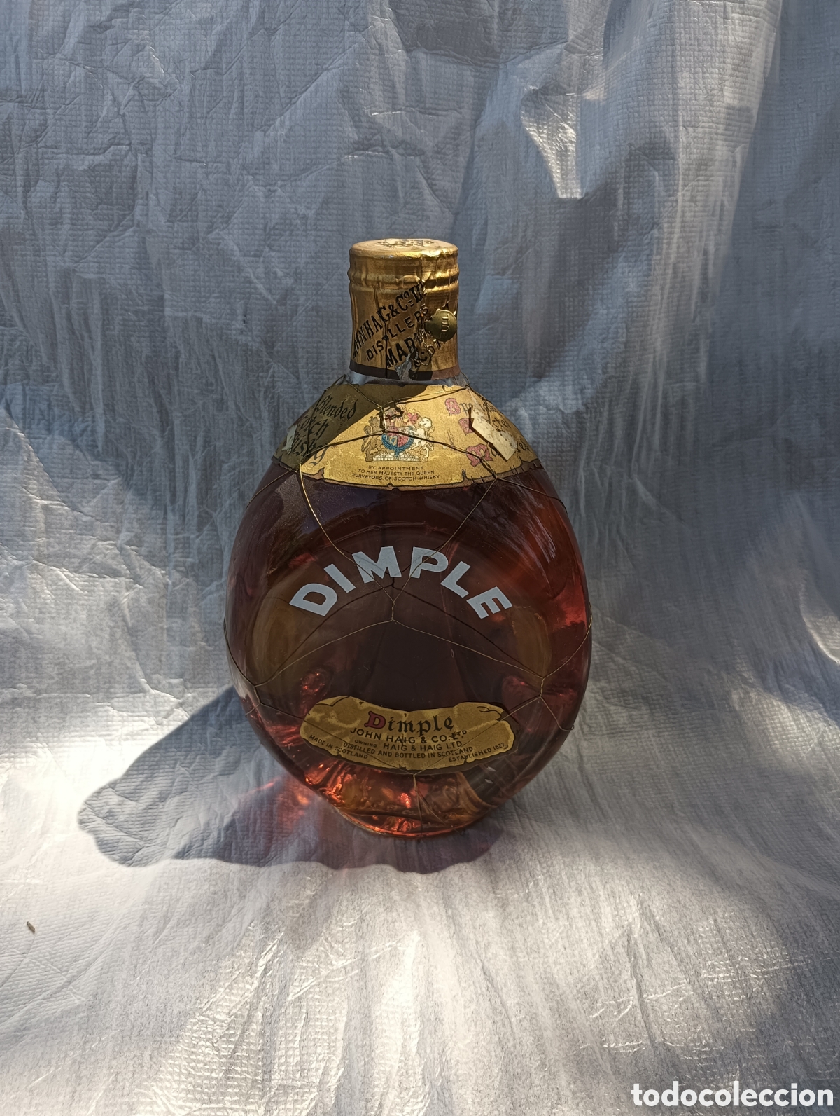 Botellas antiguas: Dimple, Whisky 1950- 60.