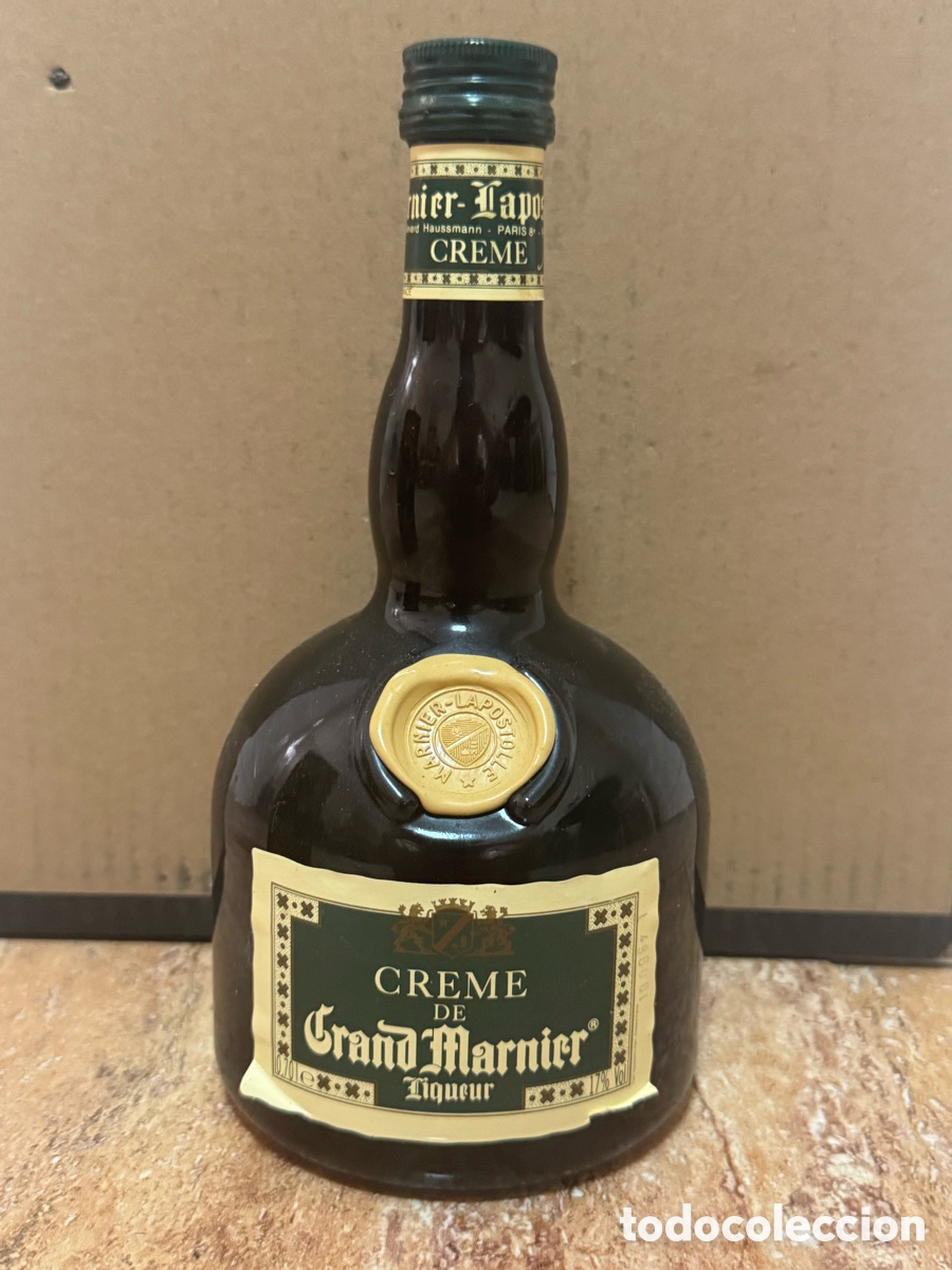 Botellas antiguas: Lote Grand Marnier Cr&egrave;me Liqueur + caja met&aacute;lica Romero Britto 1990