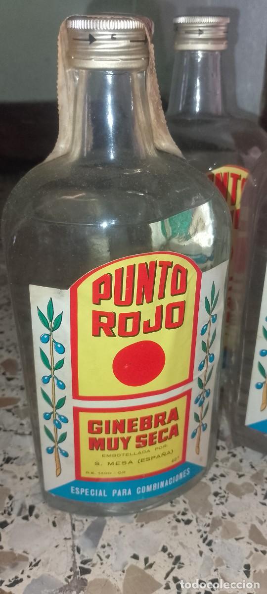 Botellas antiguas: Botellas Punto Rojo llenas