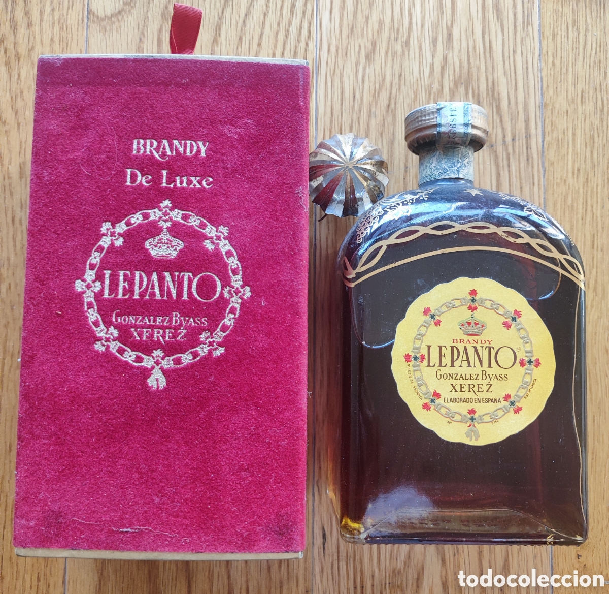 Botellas antiguas: BOTELLA BRANDY DE LUXE JEREZ LEPANTO. 75CL. PRECINTADA.