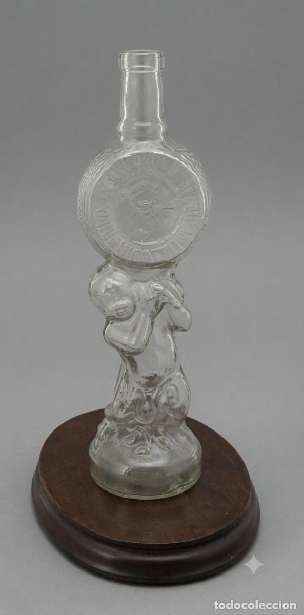 Bouteilles anciennes: ANTIGUA BOTELLA NI&Ntilde;O CON RELOJ EN CRISTAL CON RELIEVE