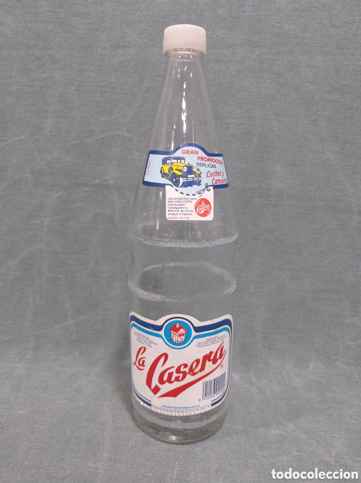Botellas antiguas: BOTELLA DE GASEOSA LA CASERA - PROMOCI&Oacute;N R&Eacute;PLICAS COCHES Y CAMIONES