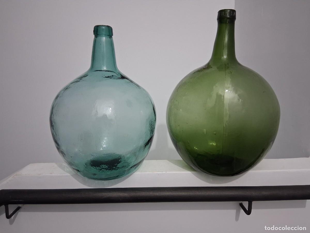 Botellas antiguas: 2 botellas garrafas damajuanas de cristal verde y azul V. Levante y Virella