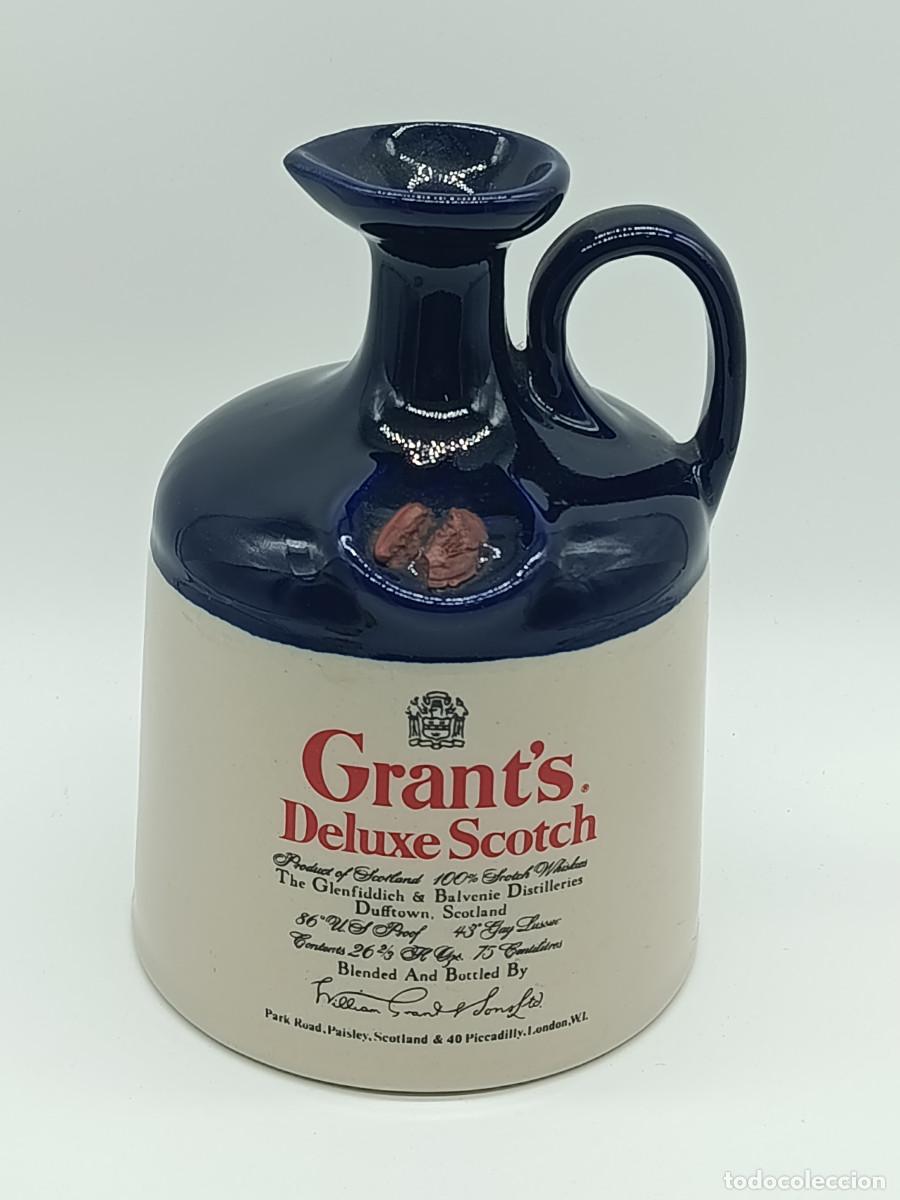 Botellas antiguas: BOTELLA CANECO VACIO GRANT&acute;S DELUXE SCOTCH WHISKY. 700ML. SIN ROTURAS. SIN TAPON. MYJ.