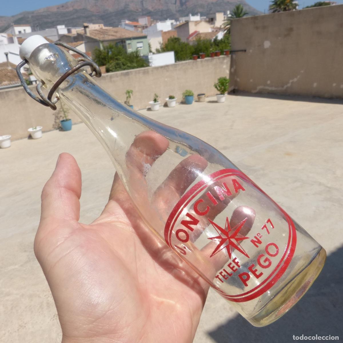 Botellas antiguas: Botella de 33cl aprox, gaseosa J.Oncina , Pego, Alicante, tef 77, 25cm, 427gr.
