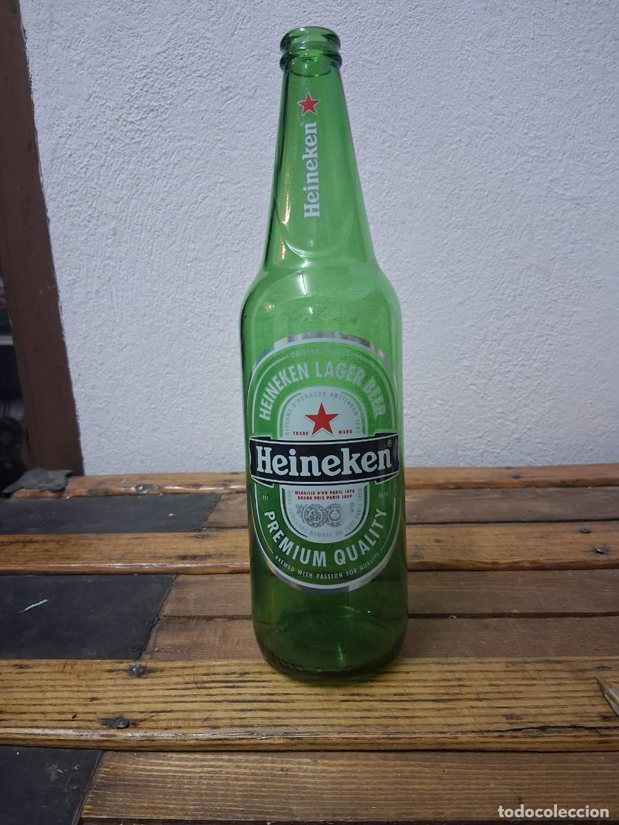 Botellas antiguas: Botella de 65 cl cerveza Heineken