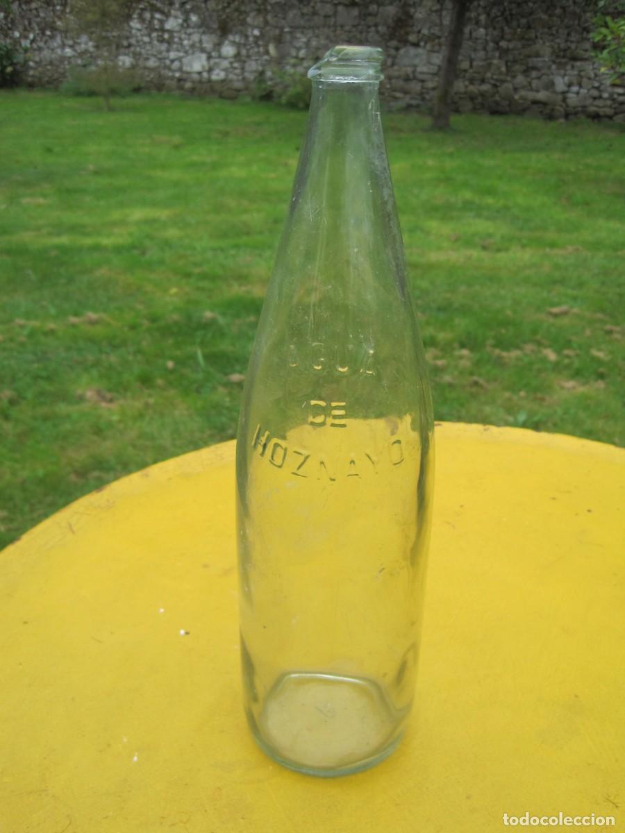 Botellas antiguas: BOTELLA DE CRISTAL AGUA DE HOZNAYO - CANTABRIA - A&Ntilde;OS 50