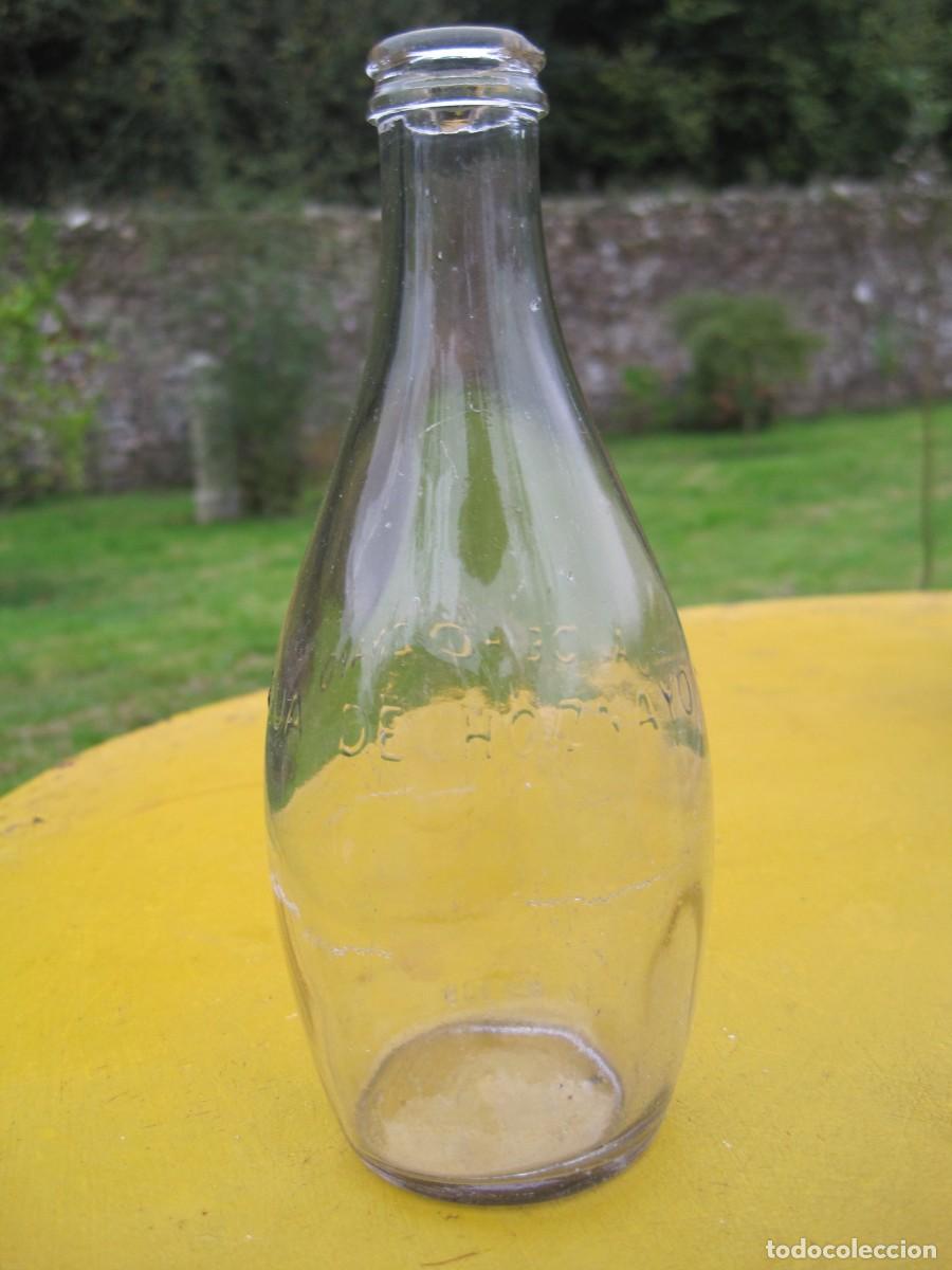 Botellas antiguas: BOTELLA DE CRISTAL AGUA DE HOZNAYO - CANTABRIA - PP. SIGLO XX