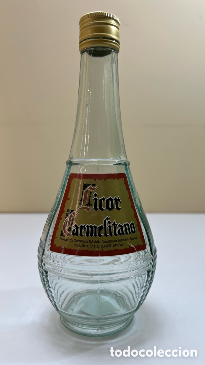 Botellas antiguas: BOTELLA LICOR CARMELITANO DESIERTO DE LAS PALMAS BENICASIM CASTELLON ,RELIEVES
