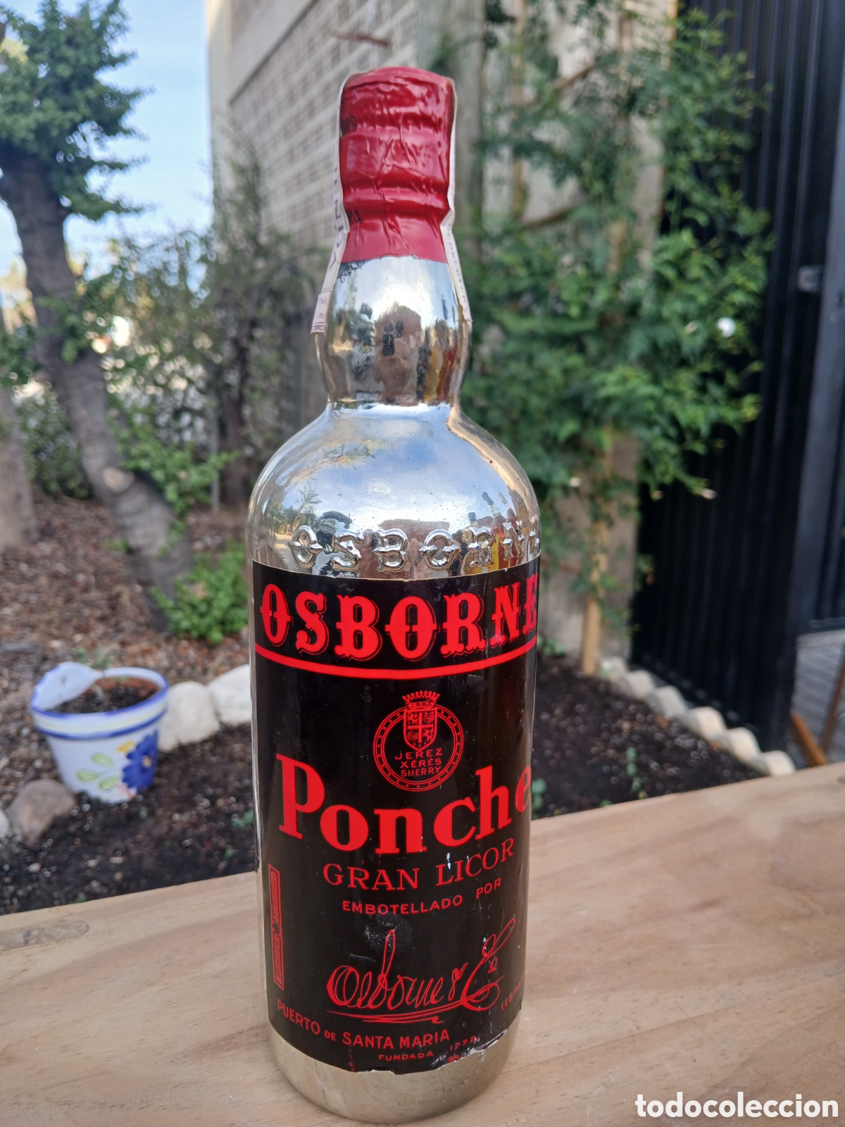 Botellas antiguas: PONCHE GRAN LICOR OSBORNE PUERTO SANTA MARIA PRECINTO 4 PESETAS.