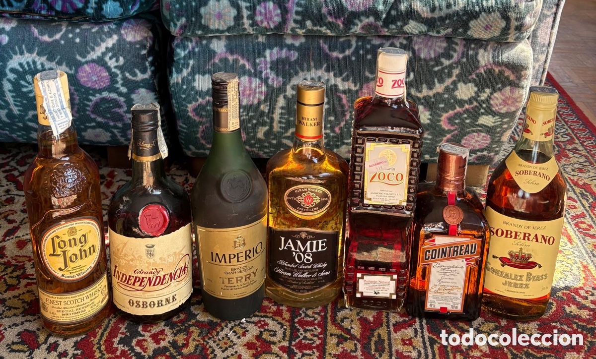 Botellas antiguas: Lote de botellas cl&aacute;sicas: Whisky, Brandy y Licores