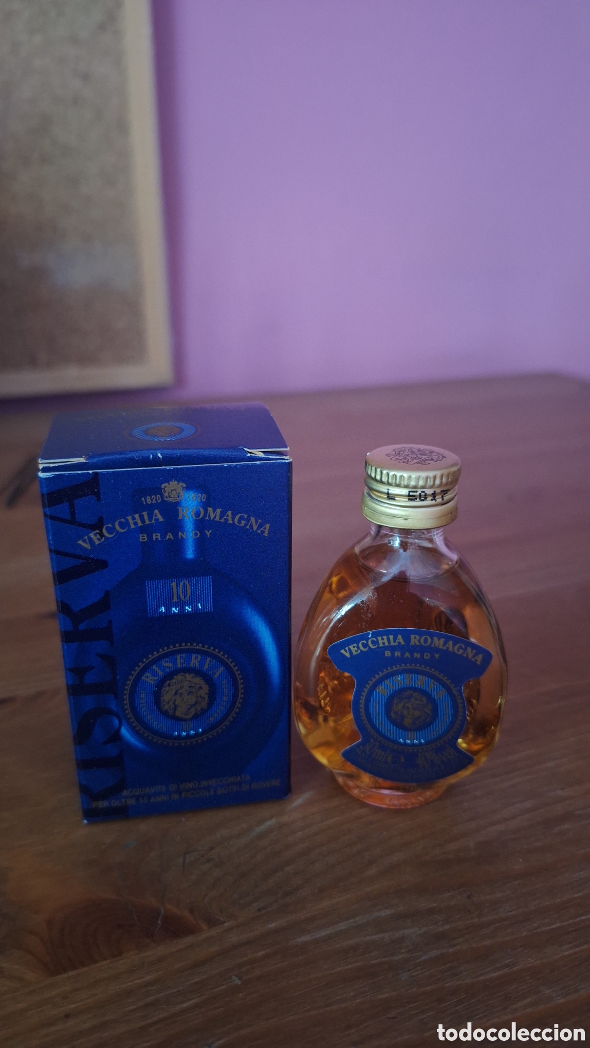 Botellas antiguas: Miniatura de botellita Brandy.