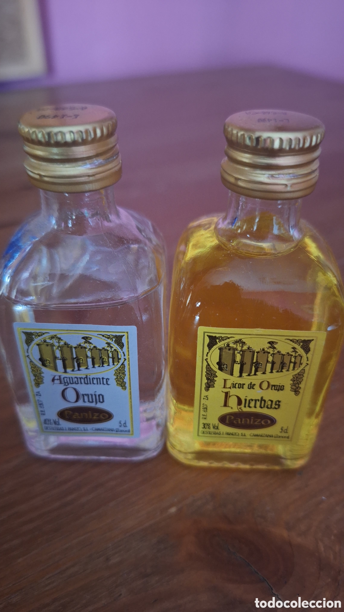 Botellas antiguas: 2 miniaturas de orujo de Panizo
