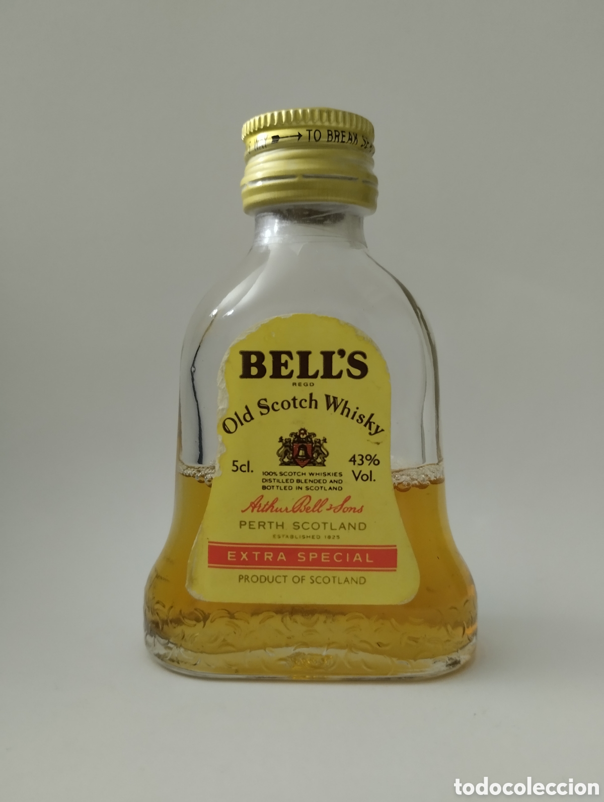 Botellas antiguas: Botellita whisky Bells