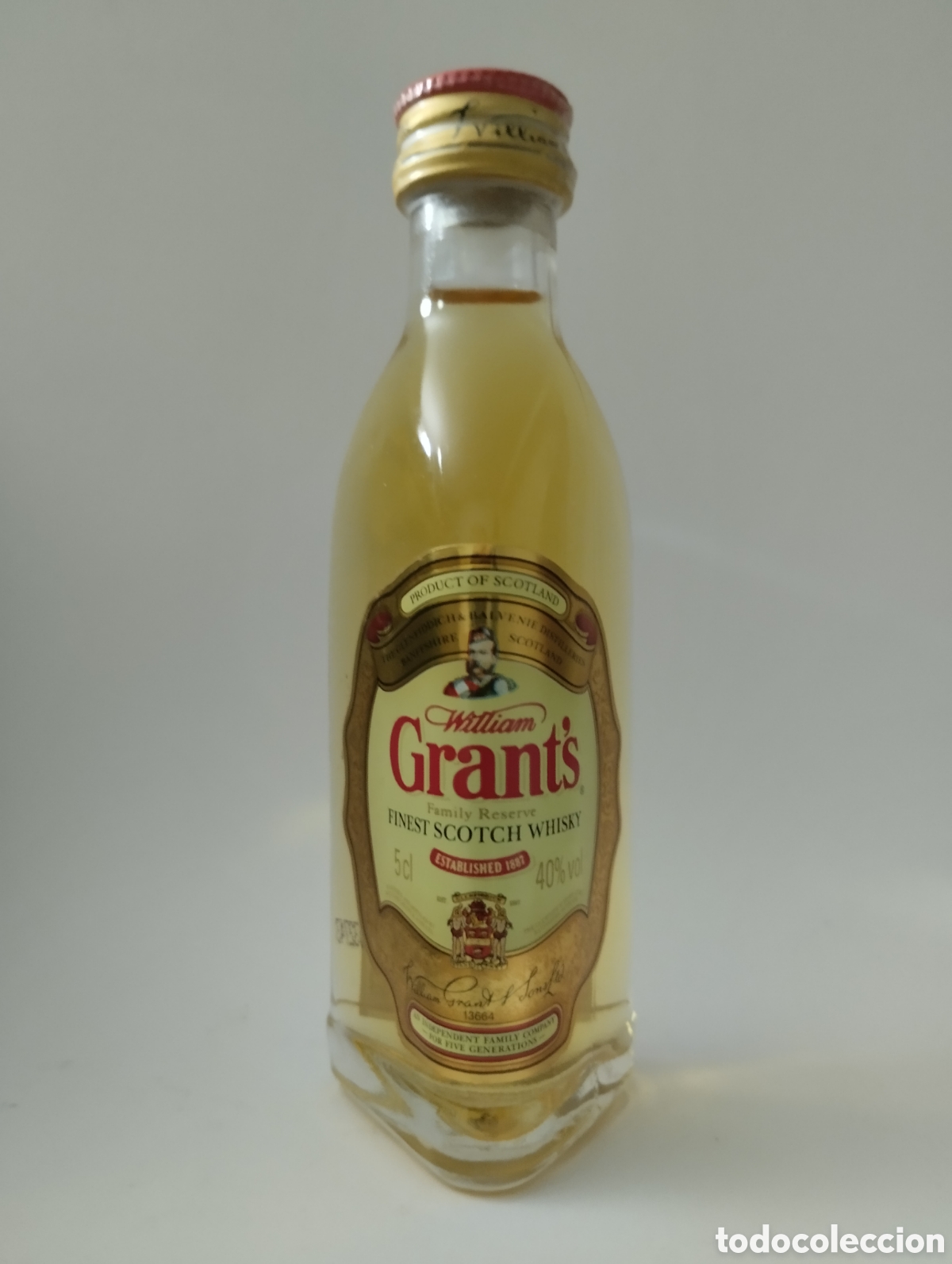 Botellas antiguas: Botellita whisky Grants - Foto 1