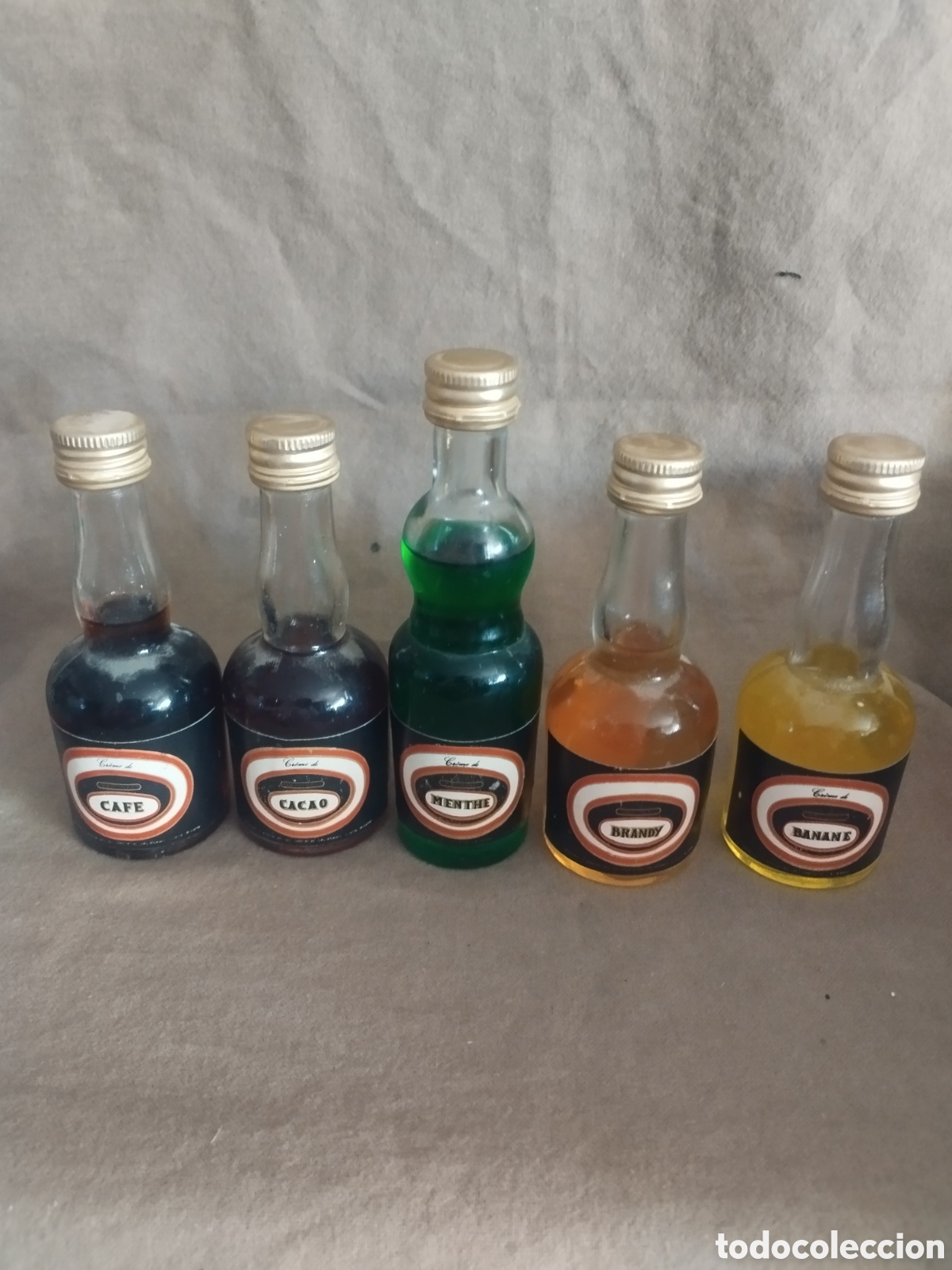 Botellas antiguas: Juego cinco botellines galiana