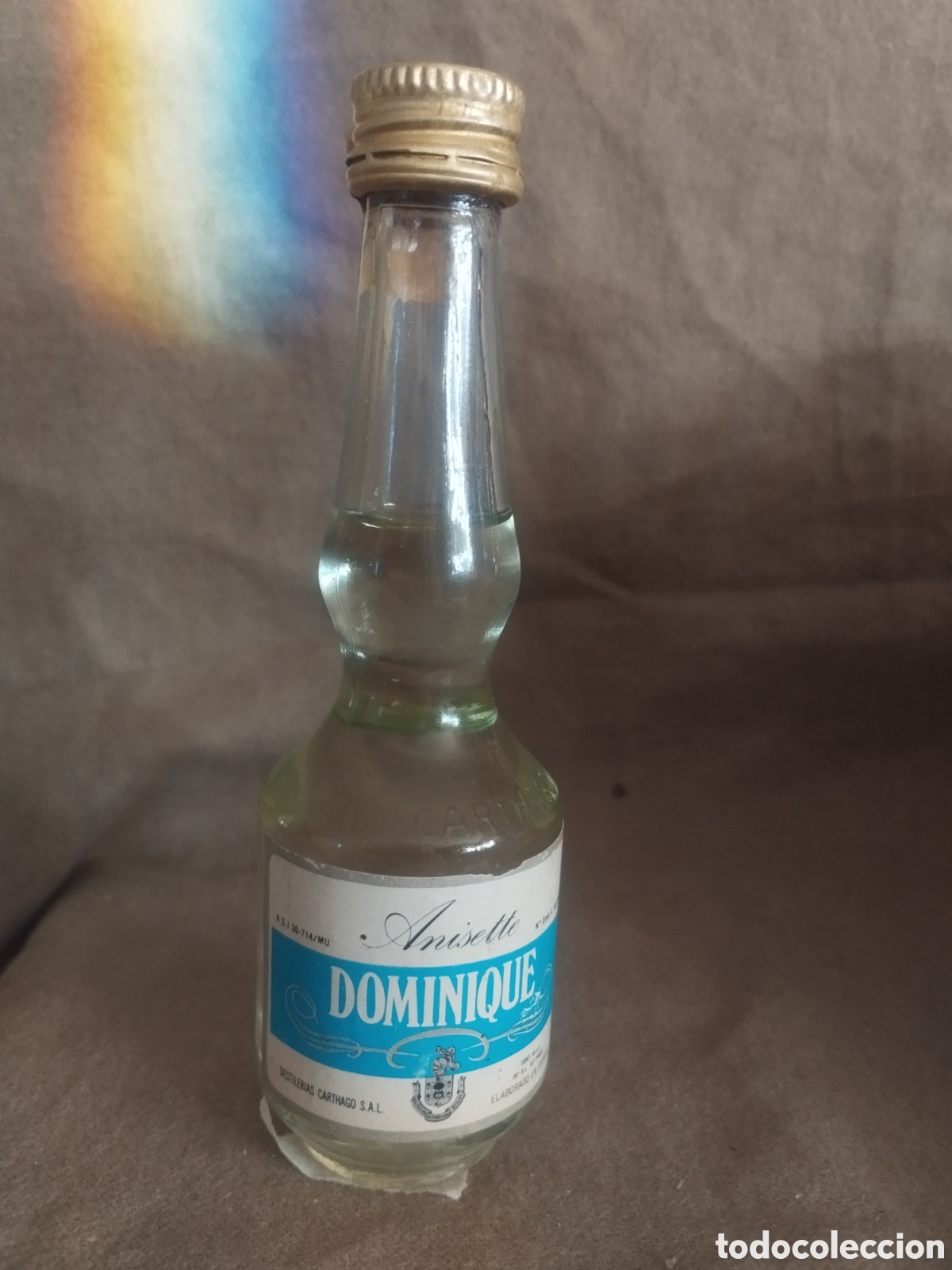 Botellas antiguas: Botellin anisete dominique