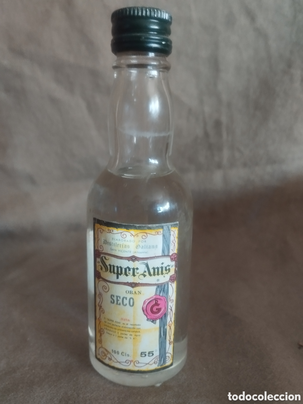 Botellas antiguas: Botellin super an&iacute;s seco oran