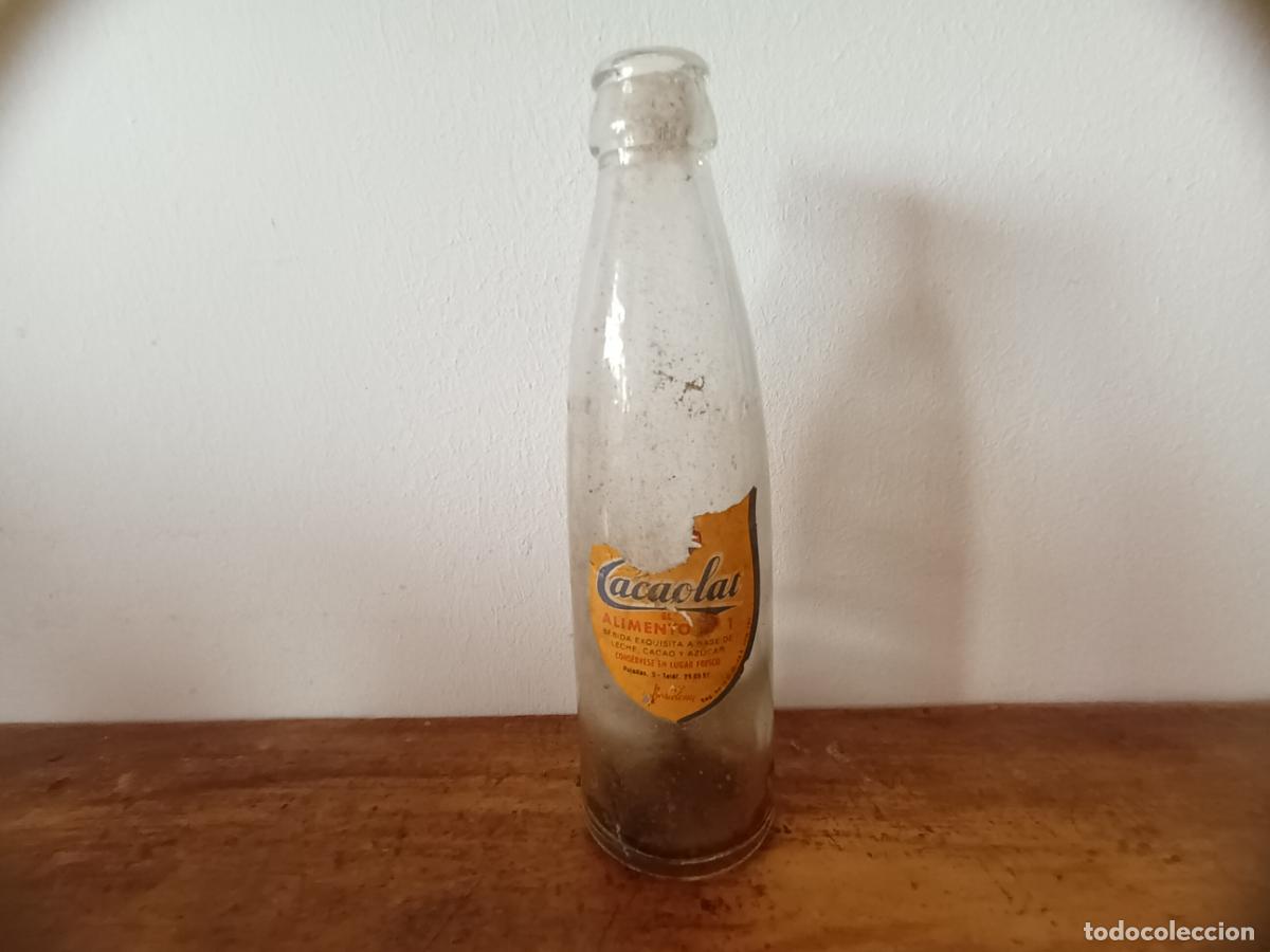 Antique bottles: ANTIGUA BOTELLA CACACAOLAT. SOCIEDAD ANONIMA LETONA