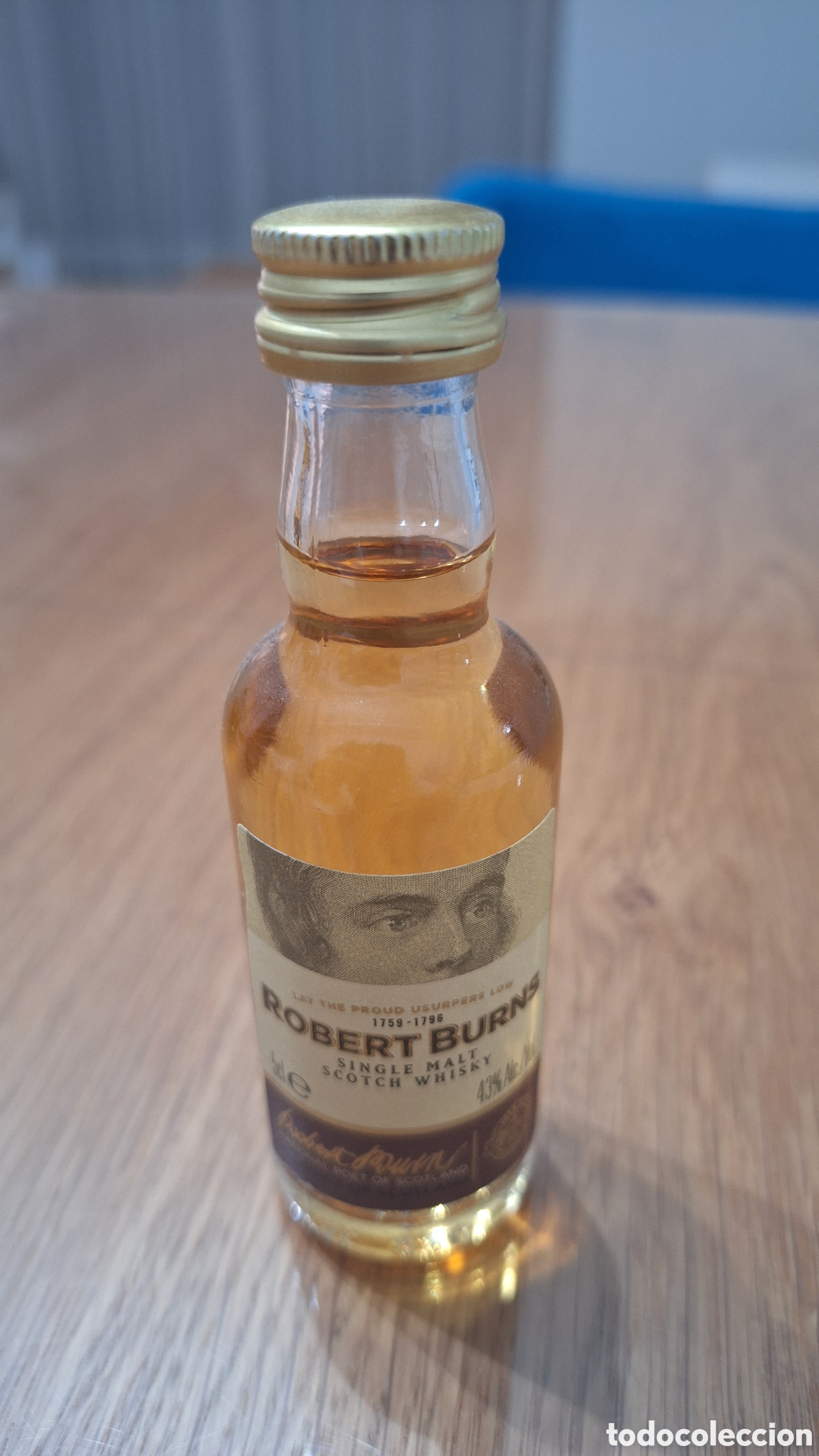 Botellas antiguas: Miniatura de Whisky Robert Burns
