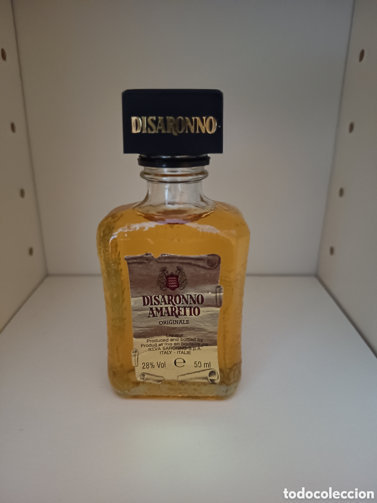 Botellas antiguas: Miniatura botella Amaretto Disaronno.
