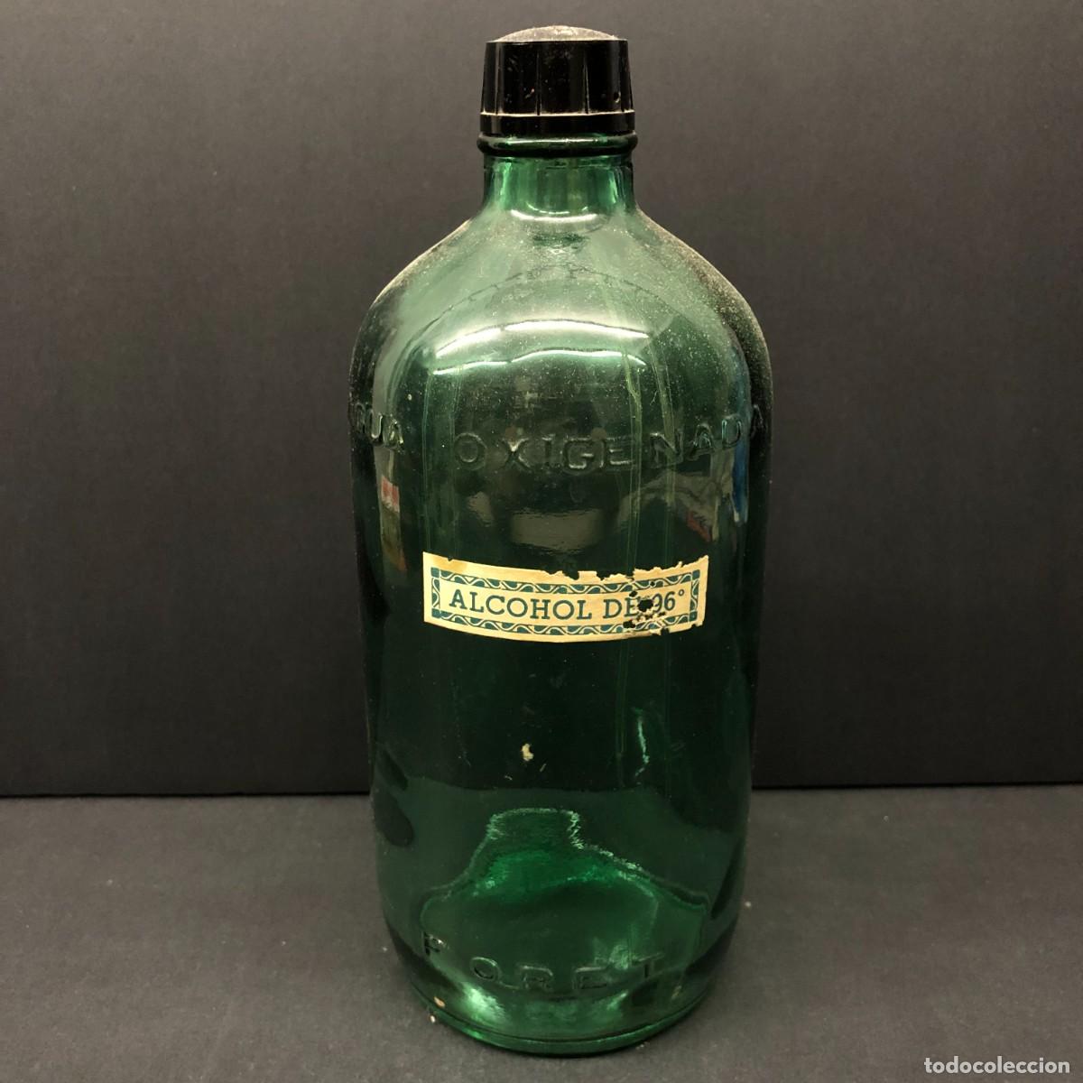 Botellas antiguas: ANTIGUA BOTELLA DE AGUA OXIGENADA - ALCOHOL DE 96&ordm; - FORET / 1602