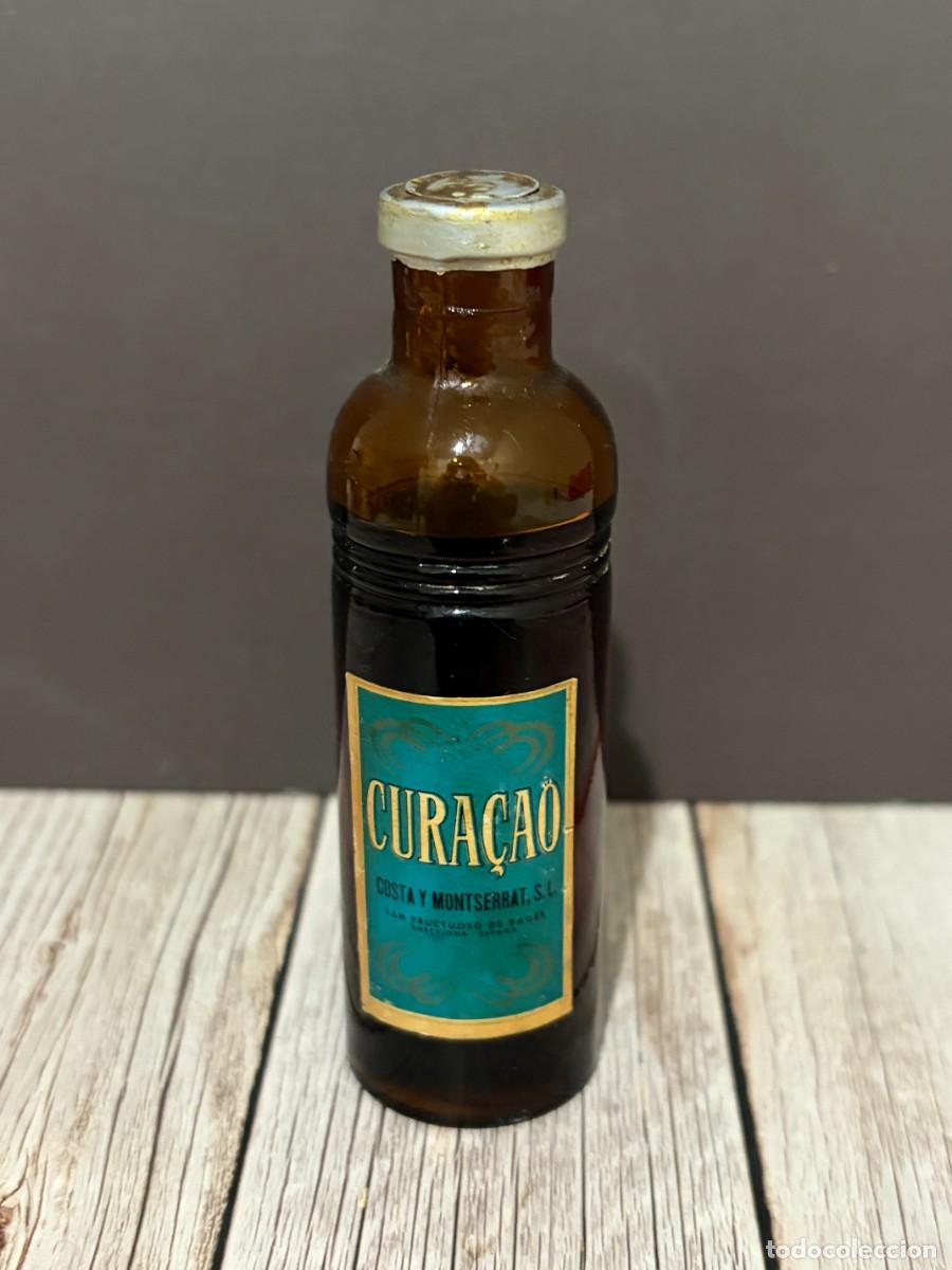 Botellas antiguas: BOTELL&Iacute;N. CURA&Ccedil;AO. COSTA Y MONTSERRAT S.L.