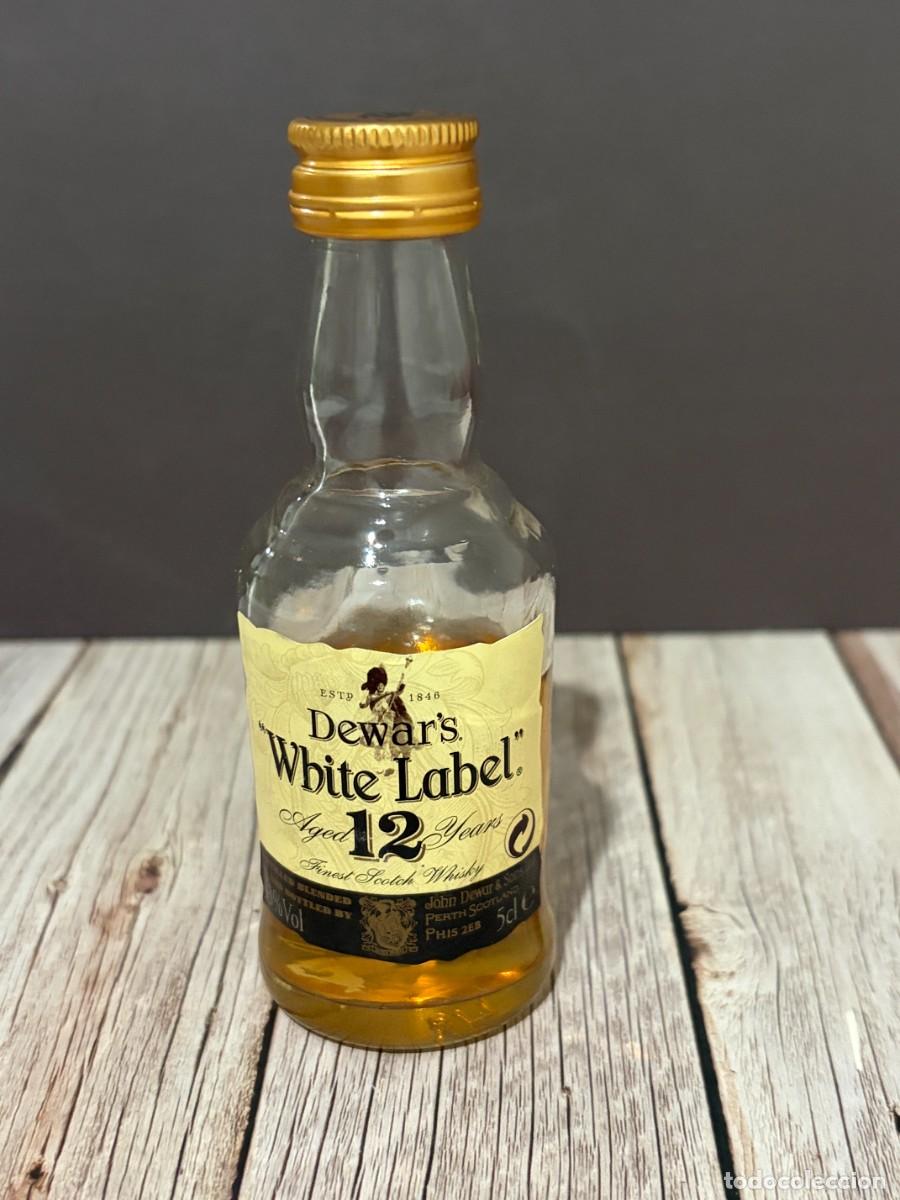 Botellas antiguas: BOTELL&Iacute;N. DEWAR'S WHITE LABEL 12 YEARS. DESTILER&Iacute;A JOHN DEWAR & SONS.