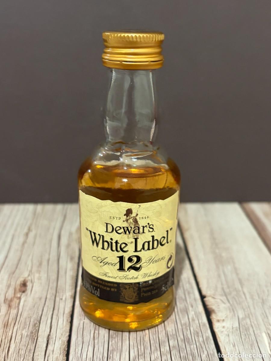 Botellas antiguas: BOTELL&Iacute;N. DEWAR'S WHITE LABEL 12 YEARS. DESTILER&Iacute;A JOHN DEWAR & SONS.
