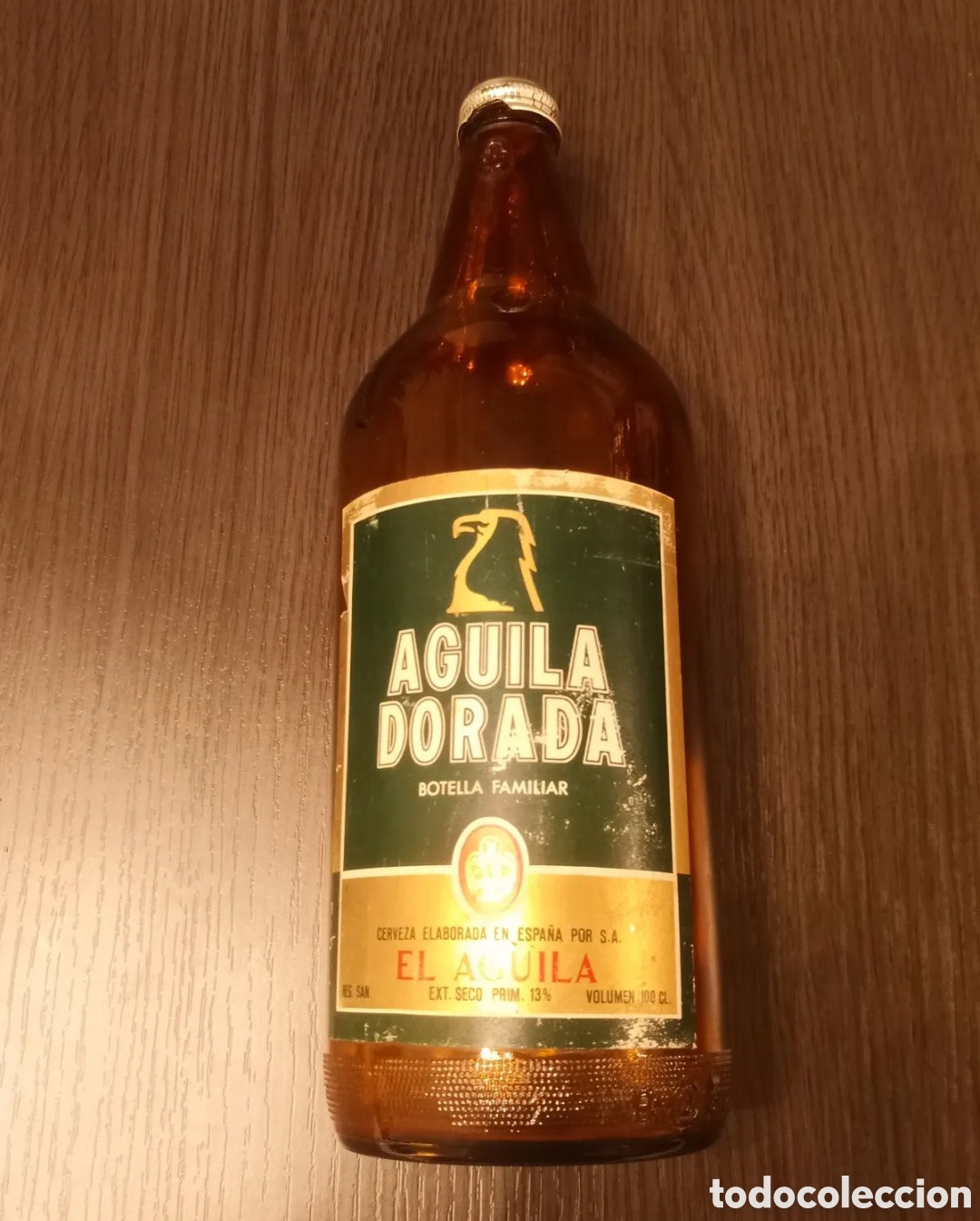 Botellas antiguas: Antigua Botella Cerveza AGUILA DORADA