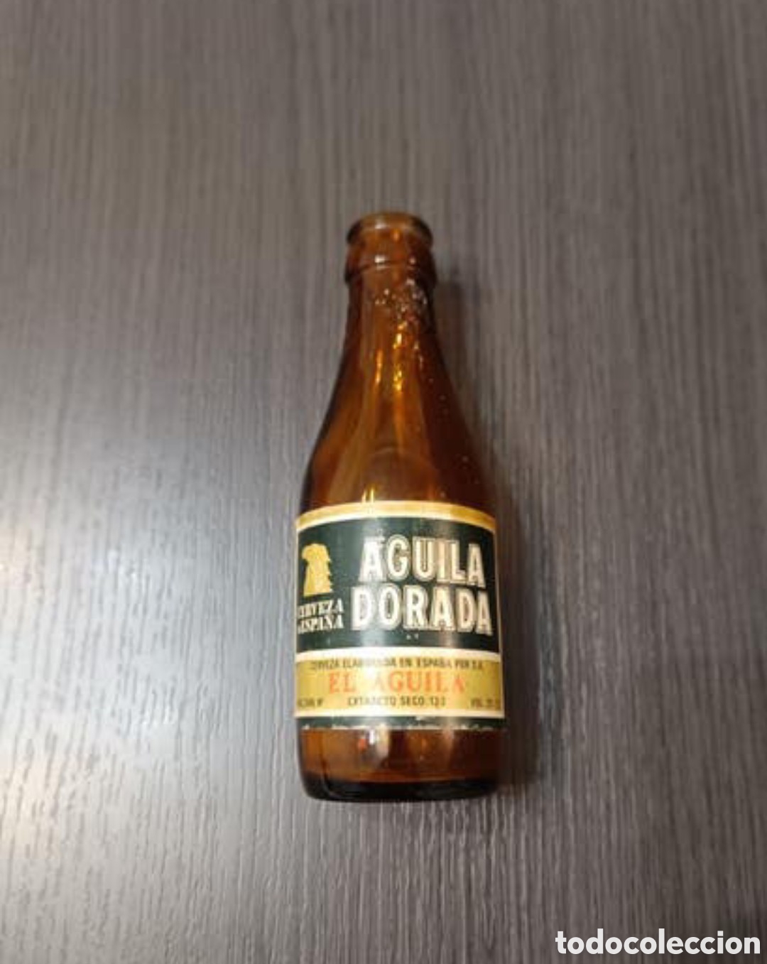 Botellas antiguas: Antiguo Botell&iacute;n Cerveza Aguila Dorada