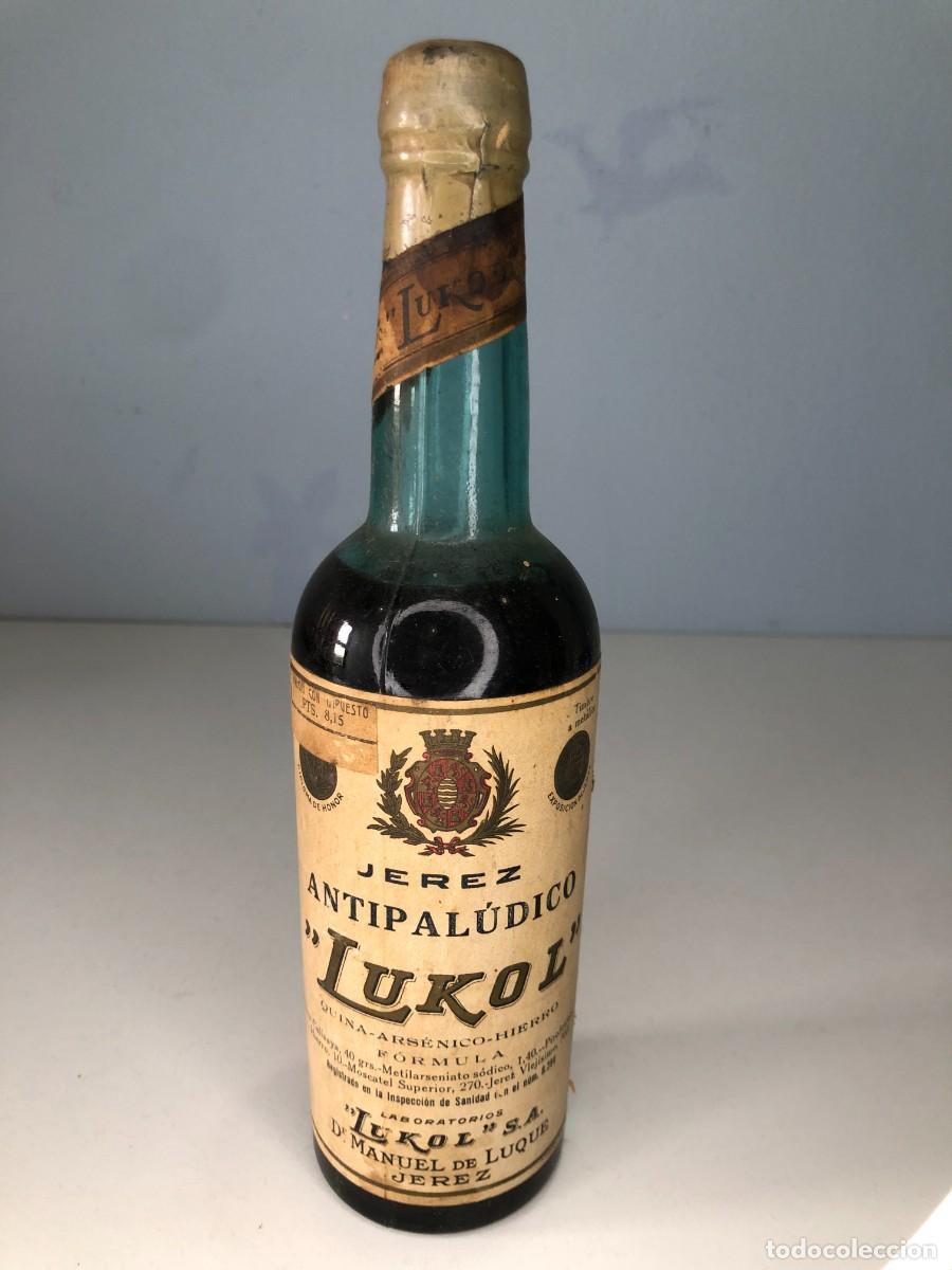 Botellas antiguas: Antigua botella Jerez Antipal&uacute;dico Lukol Dr Manuel de Luque farmacia Jerez precintada