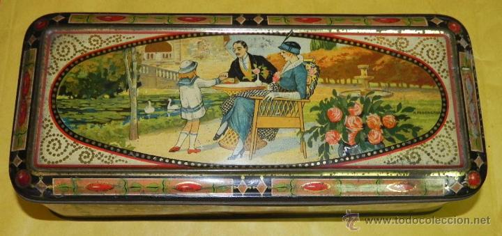 Bo&icirc;tes et petites bo&icirc;tes m&eacute;talliques: ANTIGUA CAJA DE HOJALATA LITOGRAFIADA CON PUBLICIDAD DE CHOCOLATE EXQUIS, LA SUISSE, A. RE&Ntilde;E, ILUSTR
