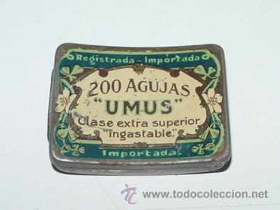 Caixas e caixinhas met&aacute;licas: Antigua caja de hojalata litografiada con publicidad de 200 agujas UMUS - muy rara, tiene forma curv