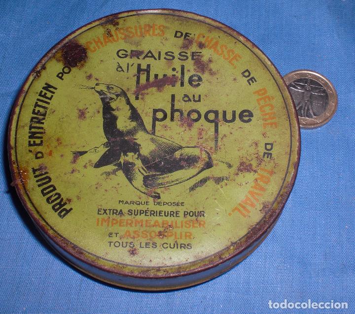 Bo&icirc;tes et petites bo&icirc;tes m&eacute;talliques: Lata de grasa de foca